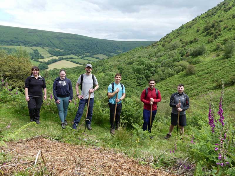 Corporate volunteer group at Cwm Bwhcel